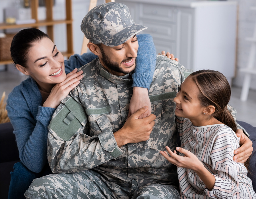 Happy veteran family sitting together